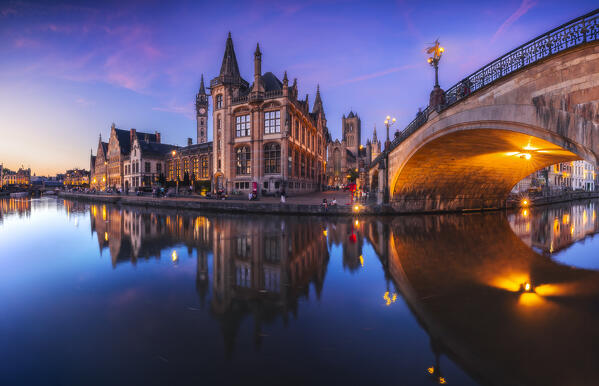 Graslei and St. Michael’s Bridge along Lys river with its beautiful illuminated Guil Houses during dusk, Gand, Belgium, East Flanders, Flanders, Western Europe