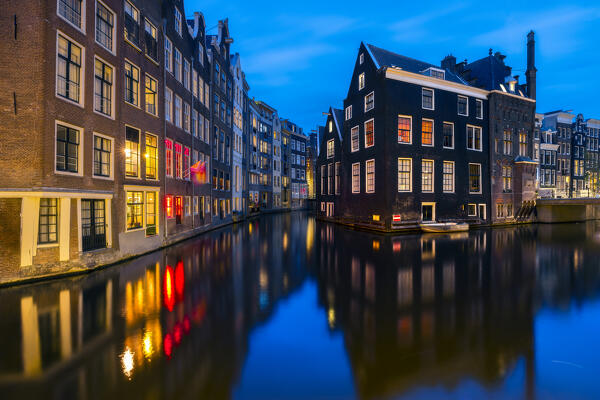 Illuminated Sint Olofssteeg corner in Amstedam during blue hour, De Wallen, Binnenstad, Netherlands, North Holland, Western Europe