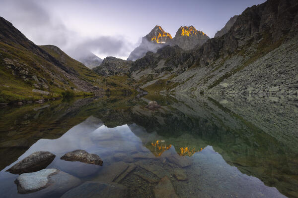 Monviso reflected in Fiorenza Lake during sunset, Crissolo, Cuneo, Piedmont, Italy, Southern Europe