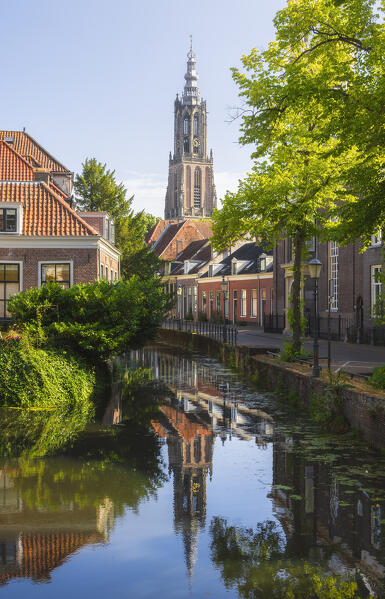 Onze Lieve Vrouwetoren and its reflection in the canal at Amersfoort during summer, Amersfoort, Netherlands, Utrecht, Western Europe