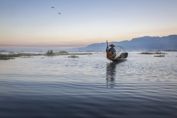Fisherman of Inle Lake at sunrise, Shan State, Myanmar, Southeast Asia