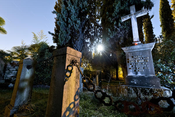 Night at the evangelical cemetery of Arco. Trento province, Trentino Alto-Adige, Italy, Europe.