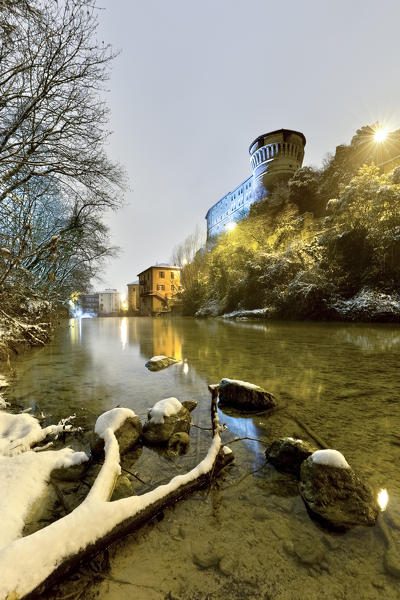 The castle of Rovereto, home of the War Museum, and the Leno stream. Trento province, Trentino Alto-Adige, Italy, Europe.