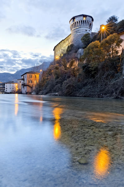 The castle of Rovereto and the Leno river in the evening. Rovereto, Trento province, Trentino Alto-Adige, Italy, Europe.