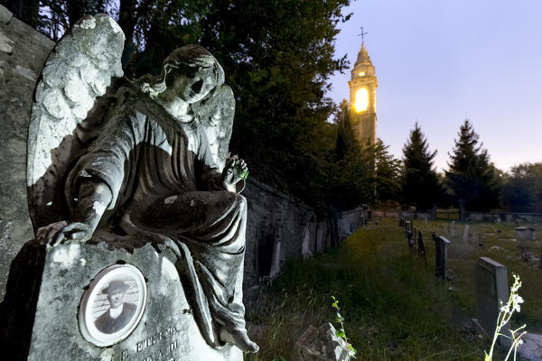 Gravestone in the ancient cemetery of the San Marziale church in Breonio. Lessinia, Fumane, Verona province, Veneto, Italy, Europe.