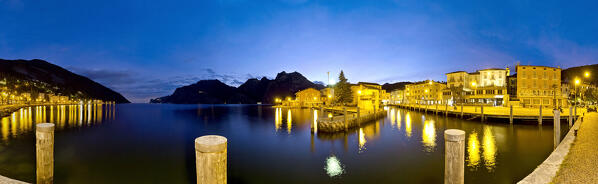 Night falls on the port of Torbole on Lake Garda. Trento province, Trentino Alto-Adige, Italy, Europe. 