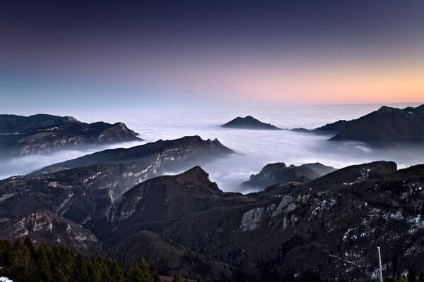 Vicenza Pre-Alps. From left to right: the Tonezza del Cimone plateau, Mount Tormeno and the slopes of Mount Toraro. Arsiero, Vicenza province, Veneto, Italy.