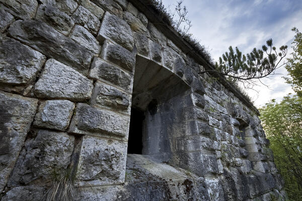 Austro-Hungarian fort of Doss Fornas: embrasure for artillery. Valsorda, Mount Vigolana, Trento, Trentino, Italy.