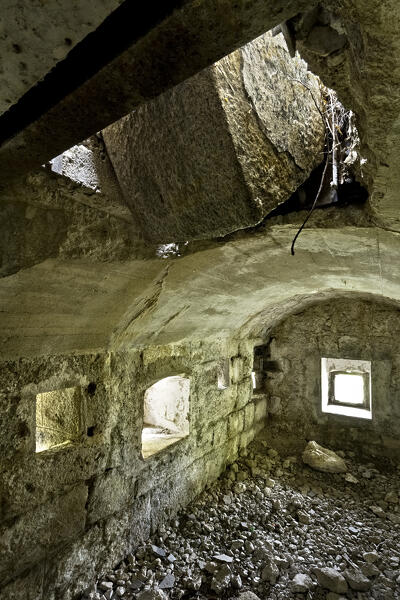Fort Doss Fornas: interior of the caponier with blocked access to the observatory on the ceiling. Valsorda, Monte Vigolana, Trento, Trentino, Italy.