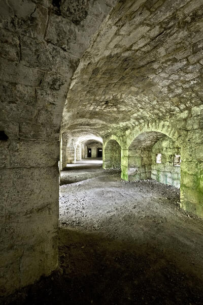Forte Doss Fornas: the interior with openings for artillery and the caponier. Valsorda, Monte Vigolana, Trento, Trentino, Italy.