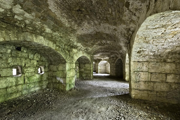 Forte Doss Fornas: the interior with openings for artillery and the caponier. Valsorda, Monte Vigolana, Trento, Trentino, Italy.