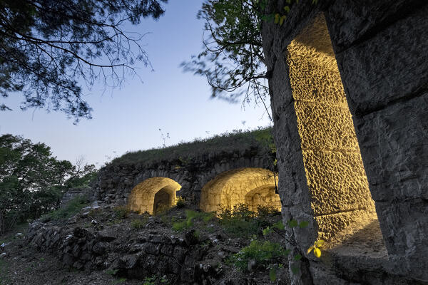 Fort Brusafer, Austro-Hungarian historical site of the Great War: the openings for artillery and a rifle loophole. Valsorda, Marzola, Trentino, Italy.