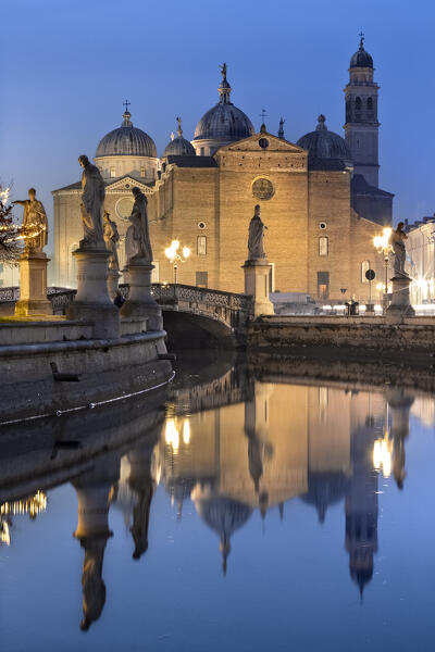 The statues of Prato della Valle and, in the background, the Abbey of Santa Giustina. Padua, Veneto, Italy.