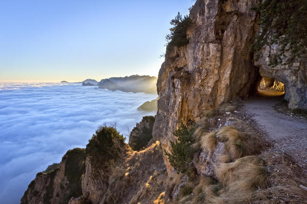 The Strada delle 52 Gallerie (Road of 52 tunnels), Pasubio massif, Vicenza Province, Veneto, Italy, Europe.
During the First World War the Italian army dug this incredible track along the cliffs of the mountain.