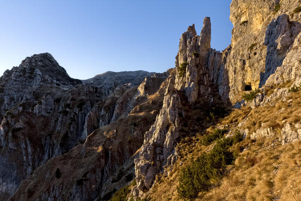 Pinnacles and cliffs along the Strada delle 52 Gallerie (Road of 52 tunnels), Pasubio massif, Vicenza Province, Veneto, Italy, Europe.