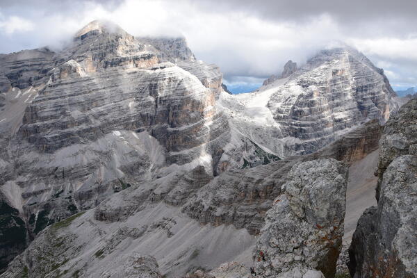 View of Tofane (Tofana di Mezzo, Tofana di Dentro and Tofana di Rozes) from Bivacco della Pace, Dolomites, Bolzano province, Trentino Alto Adige, Italy.