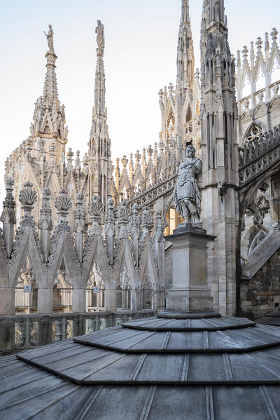 Milan, Lombardy, Italy, Europe. One of the many statues on the rooftop of Milan Cathedral