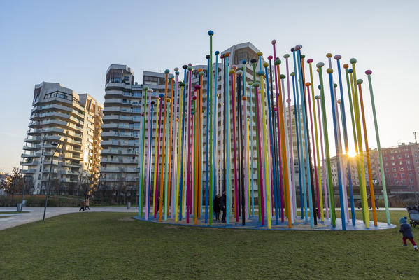 Milano, Lombardy, Italy, Europe. Coloris sculpture in front of CityLife Residences at sunset