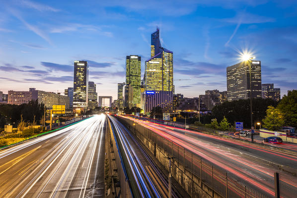Arc de la Défence and La Défence Skyscaper during the night and cars’s lights (Paris, Ile-de-France, France, Europe)