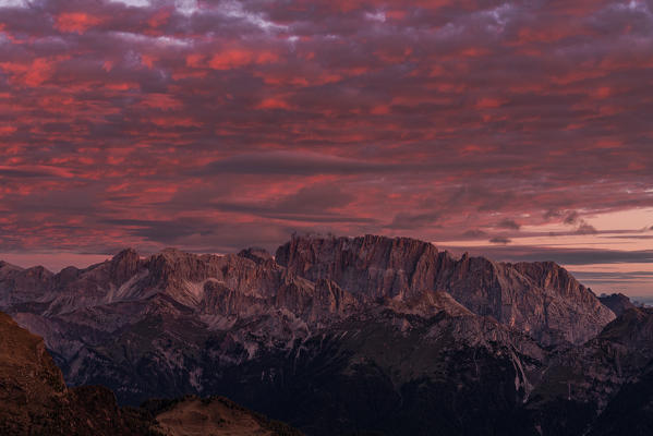 Sunrise on a wild spot of the Pale di San Lucano group, over Agordo.