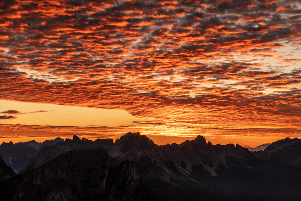 Sunrise on a wild spot of the Pale di San Lucano group, over Agordo