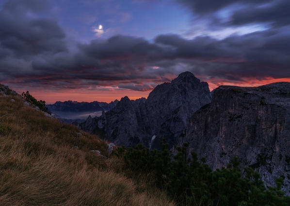 Sunrise on a wild spot of the Pale di San Lucano group, over Agordo