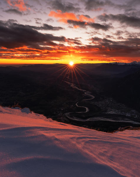 Sunset on the top of Dolada Mount, in Alpago mountain range, Veneto, Italy