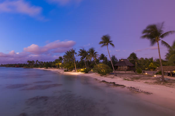 Le Maitai resort bungalows at dusk, Fakarawa, Tuamotu Archipelago, French Polynesia.