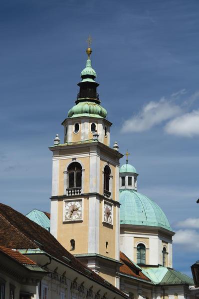 Buildings in Town Square and the cathedral of Saint Nicholas in the background, Ljubljana, Slovenia.