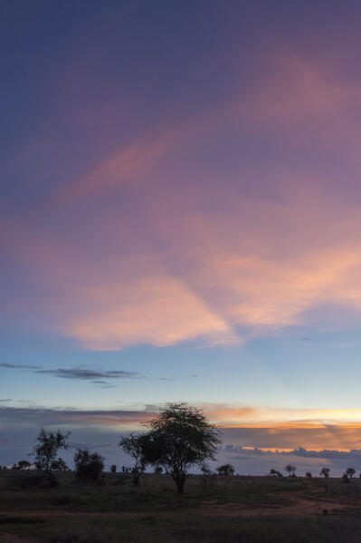 Sunset over Lualenyi game reserve, Tsavo, Kenya.