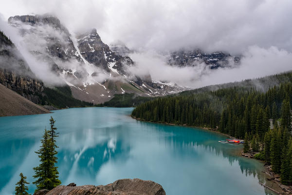 Canada, Alberta, Banff National Park, Moraine Lake: Teen Peaks into the fog