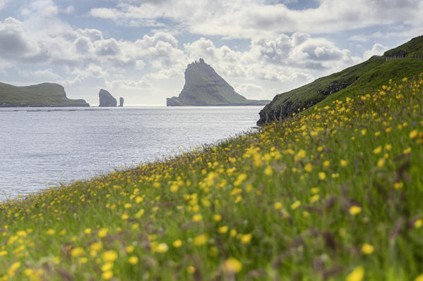 Europe, Denmark, Faroe Islands, Vagar, Bour: Drangarnir, Tindholmur over the Sorvagsfjordur