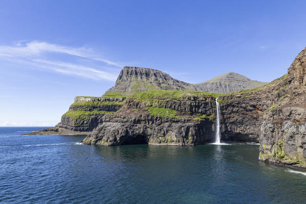 Europe, Denmark, Faroe Islands, Vagar, Gasaladur: Mulafoss, the iconic postcard waterfall 