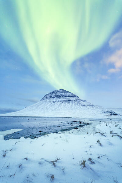 Europe, Iceland: Kirkjufell under the green Aurora Borealis' sky