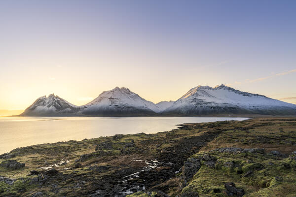 Europe, Southern Iceland: Naustin í Papafirdi viewpoint with the ocean reflecting the sunset