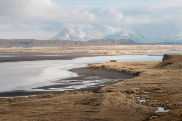 The northern coastline and a farm on a fjord: Northern Iceland, Europe
