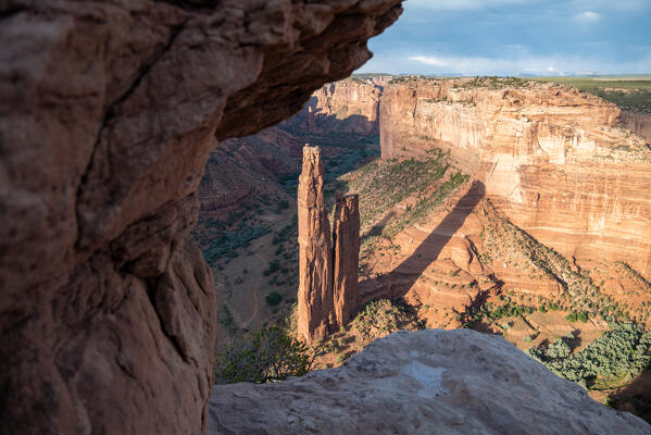 The Spider Rock framed in a corner of the cliffs from the edge of Canyon de Chelly National Monument; Arizona, United States of America