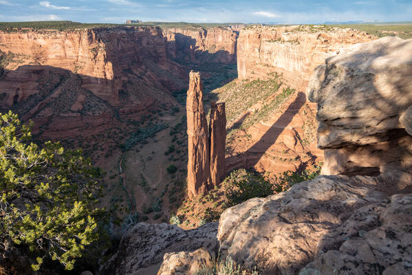A sunset view of the Spider Rock from the edge of the Canyon de Chelly National Monument; Arizona, United States of America