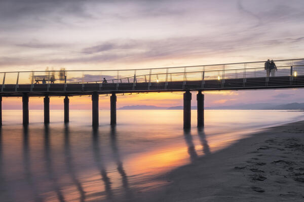Long exposure at sunset on the pier of Lido di Camaiore, Lucca province, Versilia, Tuscany, Italy, Europe