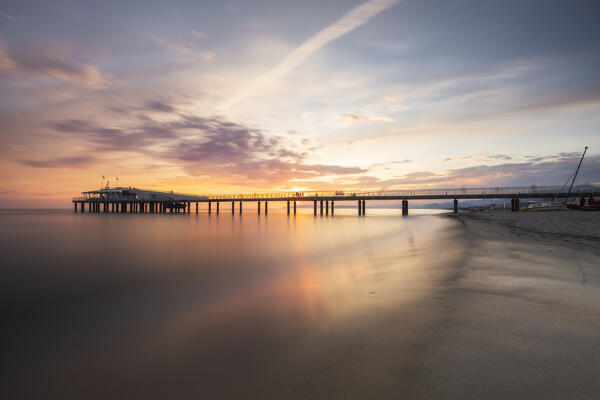 Long exposure at sunset on the pier of Lido di Camaiore, Lucca province, Versilia, Tuscany, Italy, Europe