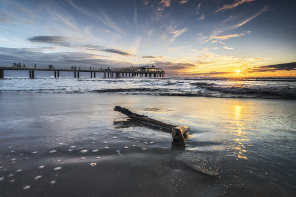 Sunset on the jetty of Lido di Camaiore, province of Lucca, Versilia, Tuscany, Italy, Europe
