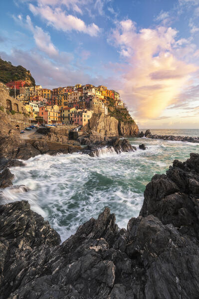 Sunset on the cliff of the village of Manarola, Cinque Terre National Park, municipality of Riomaggiore, La Spezia province, Liguria district, Italy, Europe
