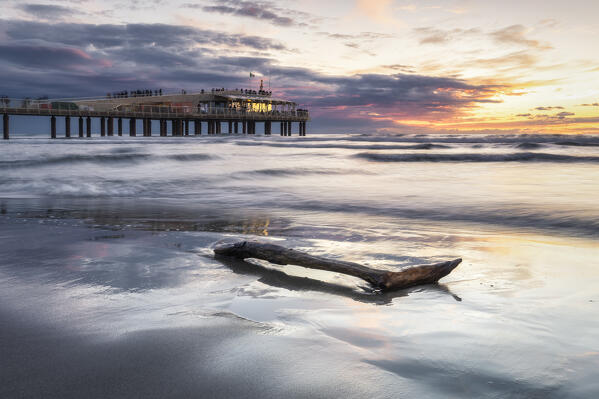 Sunset on the jetty of Lido di Camaiore, province of Lucca, Versilia, Tuscany, Italy, Europe
