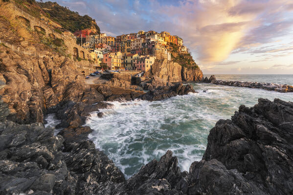 Sunset on the cliff of the village of Manarola, Cinque Terre National Park, municipality of Riomaggiore, La Spezia province, Liguria district, Italy, Europe
