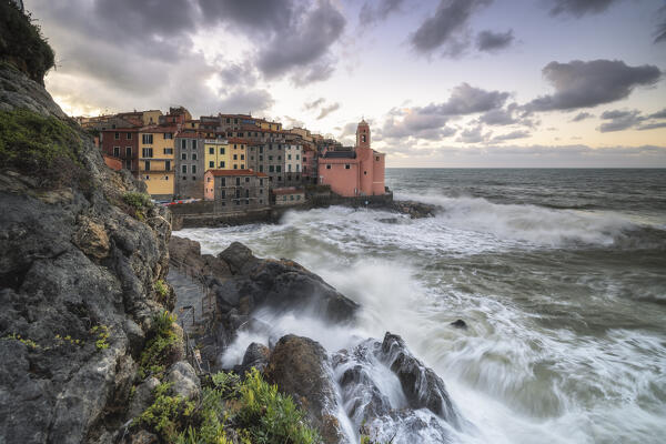 Rough sea at sunrise on the cliff of Tellaro, municipality of Lerici, La Spezia province, Liguria district, Italy, Europe
