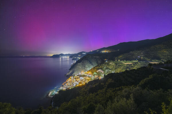Northern Lights over Riomaggiore and the Cinque Terre coast, municipality of Riomaggiore, La Spezia provence, Liguria, Italy, Europe