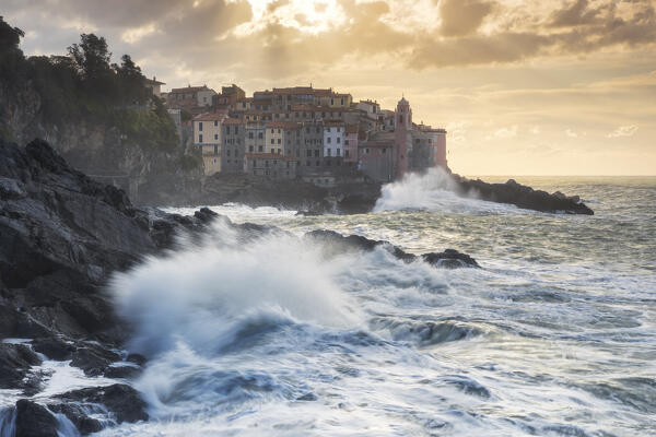 Rough sea at sunrise on the cliff of Tellaro, municipality of Lerici, La Spezia province, Liguria district, Italy, Europe
