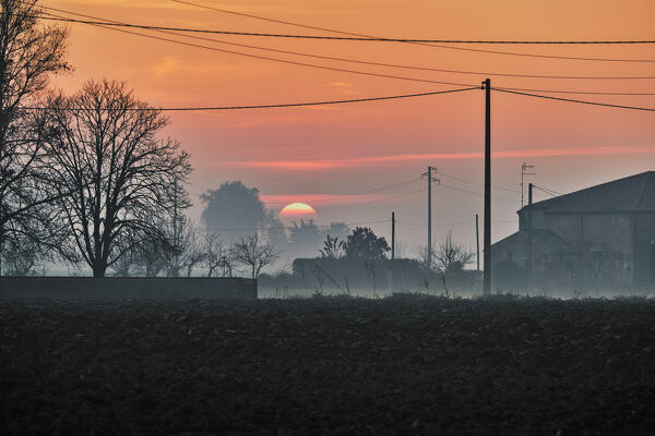 Plowed fields during sunset, Saletta, Copparo municipality, Ferrara Province, Emilia Romagna, Italy