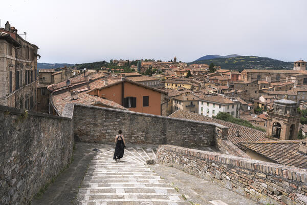 A young woman walking through 