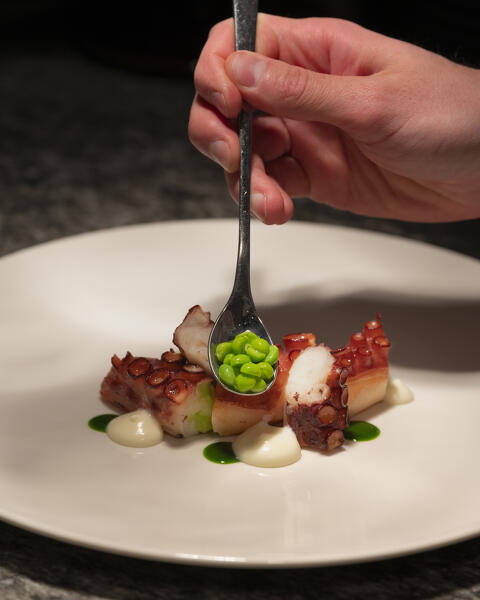 Bbq octopus, peas, crescenza and wild garlic